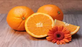 Interpretaties van Ibn Sirin om sinaasappels in een droom te zien eten